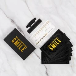 The Million Dollar Smile® - Teeth Whitening Strips - Crest Whitestrips -Tandenbleken - 28 Bleekstrips - 14 Behandelingen - Professionele Tandenbleek Strips - Tandenblekers - Wittere Tanden - Zonder Peroxide - Tanden Bleken - -Verzorgingsproducten 1200x1200 1359